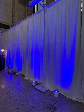 Pipe and Drape with Blue Uplights